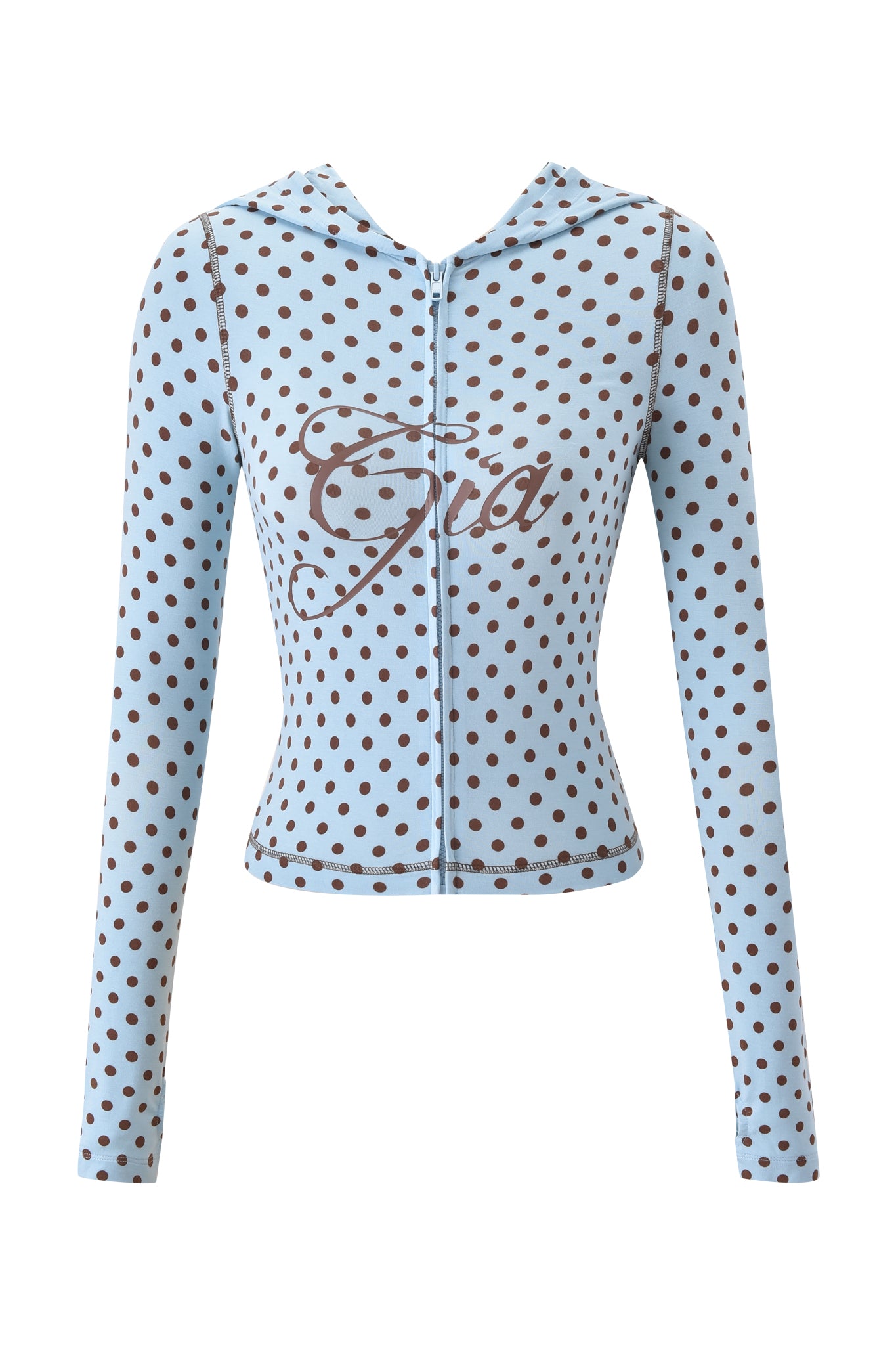 The BLARE HOODIE - BLUE POLKA DOT by I.AM.GIA is a light blue, long-sleeve hoodie with brown polka dots, "Gia" in brown script on the chest, a fitted cropped cut, and a zip-up front for a stylish look.