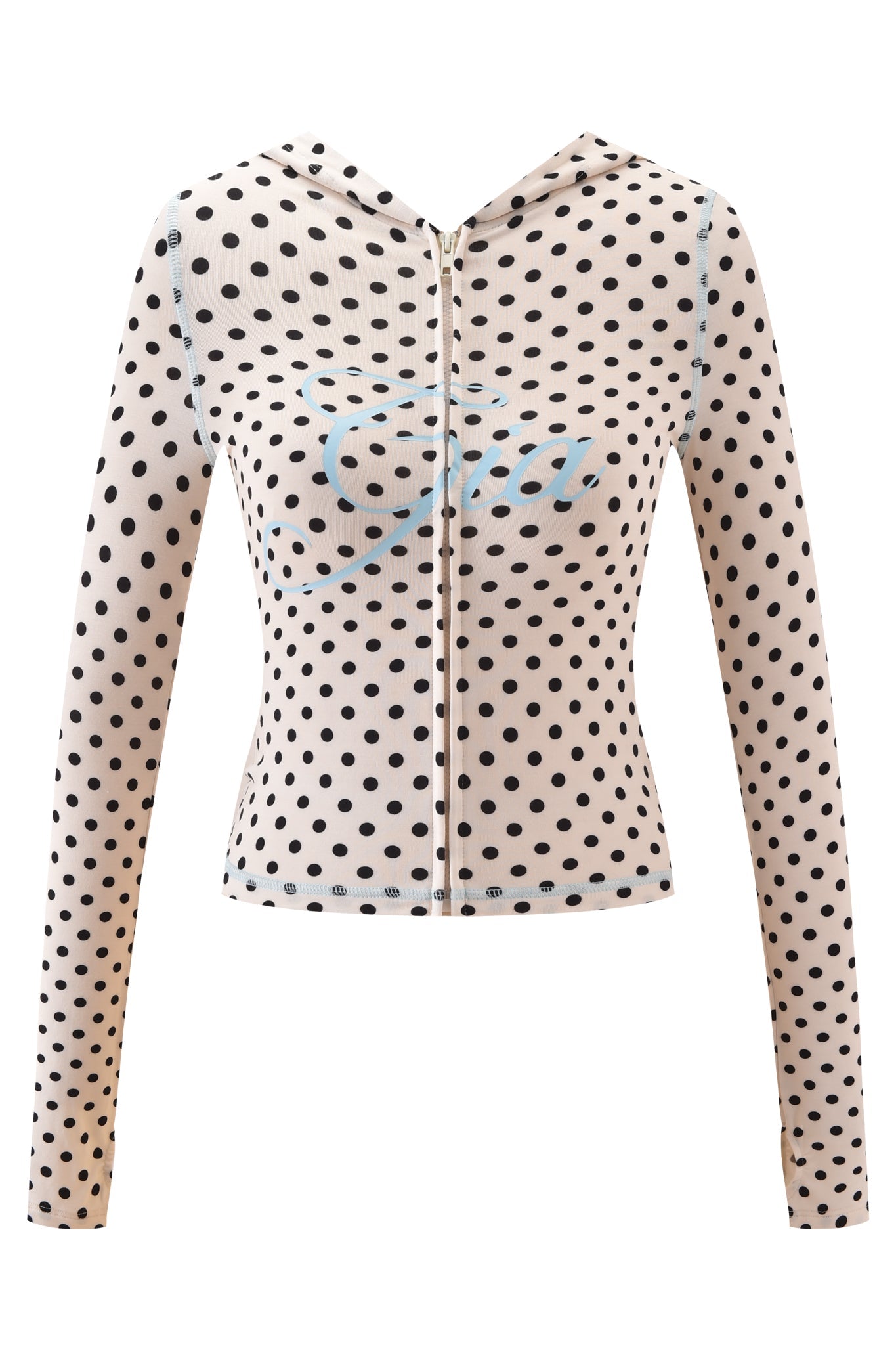 The BLARE HOODIE - CREAM POLKA DOT by I.AM.GIA is a beige, long-sleeve zip-up made from soft viscose jersey with black polka dots and light blue script across the chest. The fitted design is shown on a white background.