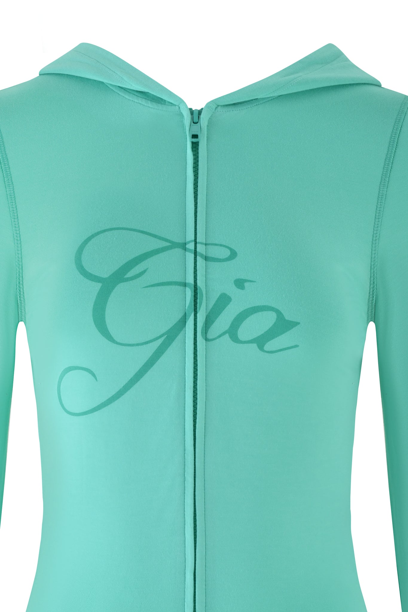 The I.AM.GIA Blare Hoodie in turquoise teal displays "Gia" in large, elegant script across the chest. It features a front zipper and hood, seamlessly combining comfort with style against a plain white backdrop.