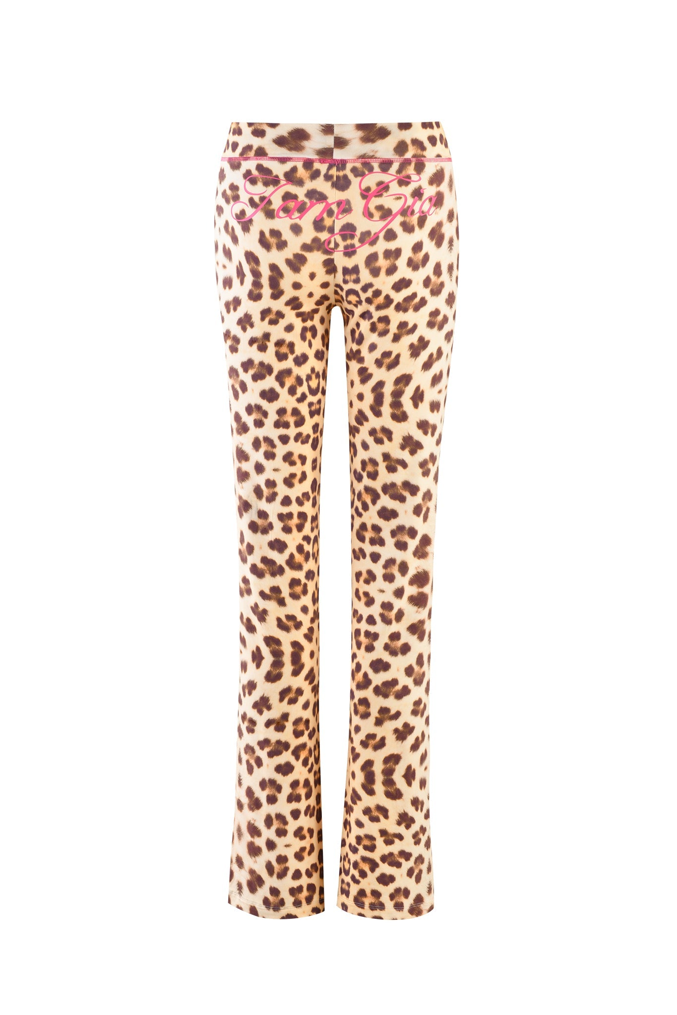 A pair of I.AM.GIA Blare Trackpant - Neutral : Leopard : Wild Card is shown against a white background. The pants feature a bold animal print pattern in shades of brown, black, and cream, with pink cursive text on the back waistband. These trackpants have a straight-leg cut and a low-rise waist.