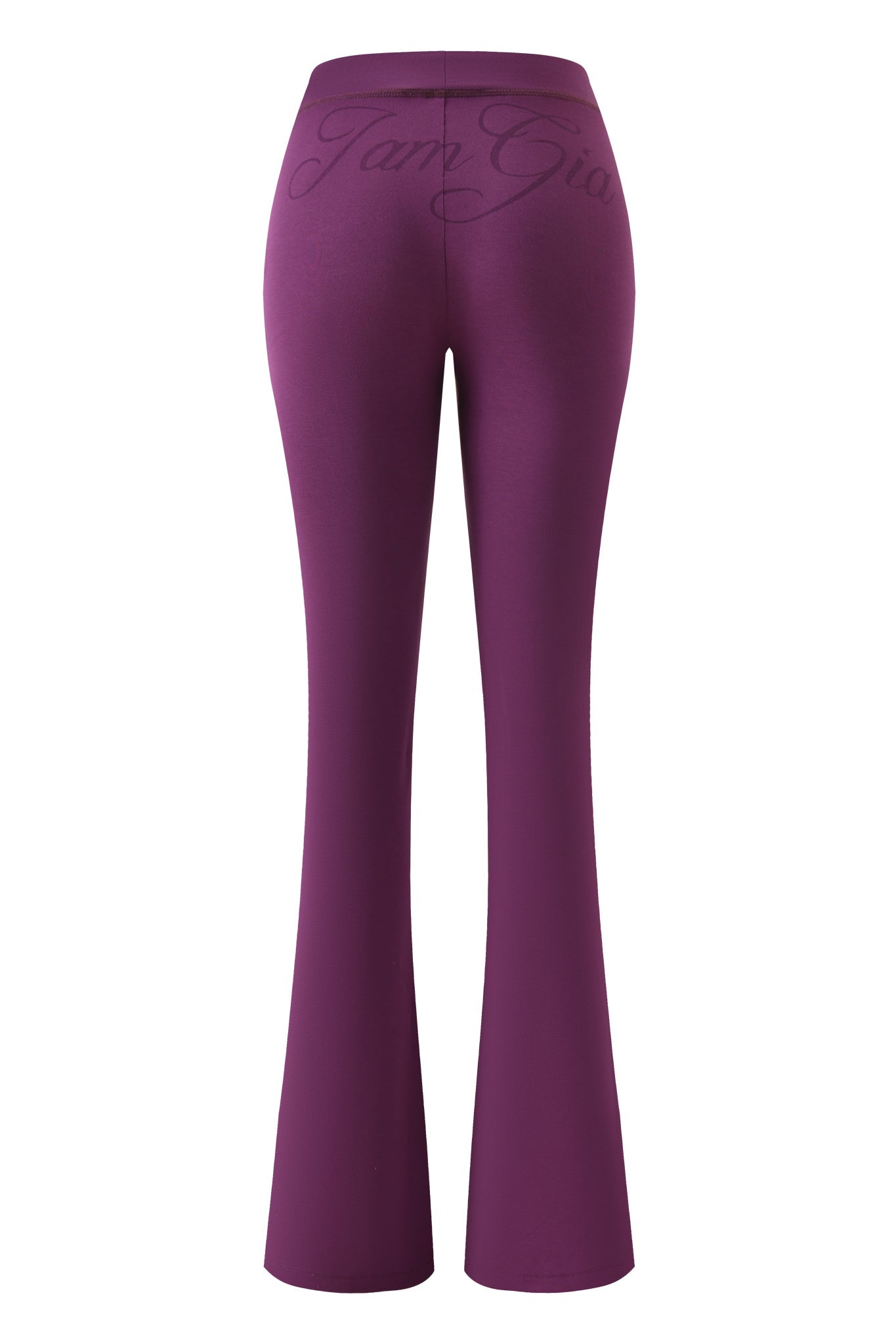 The BLARE TRACKPANT - PLUM by I.AM.GIA is a high-waisted, flared trackpant viewed from the back, with subtle cursive text across the waistband.
