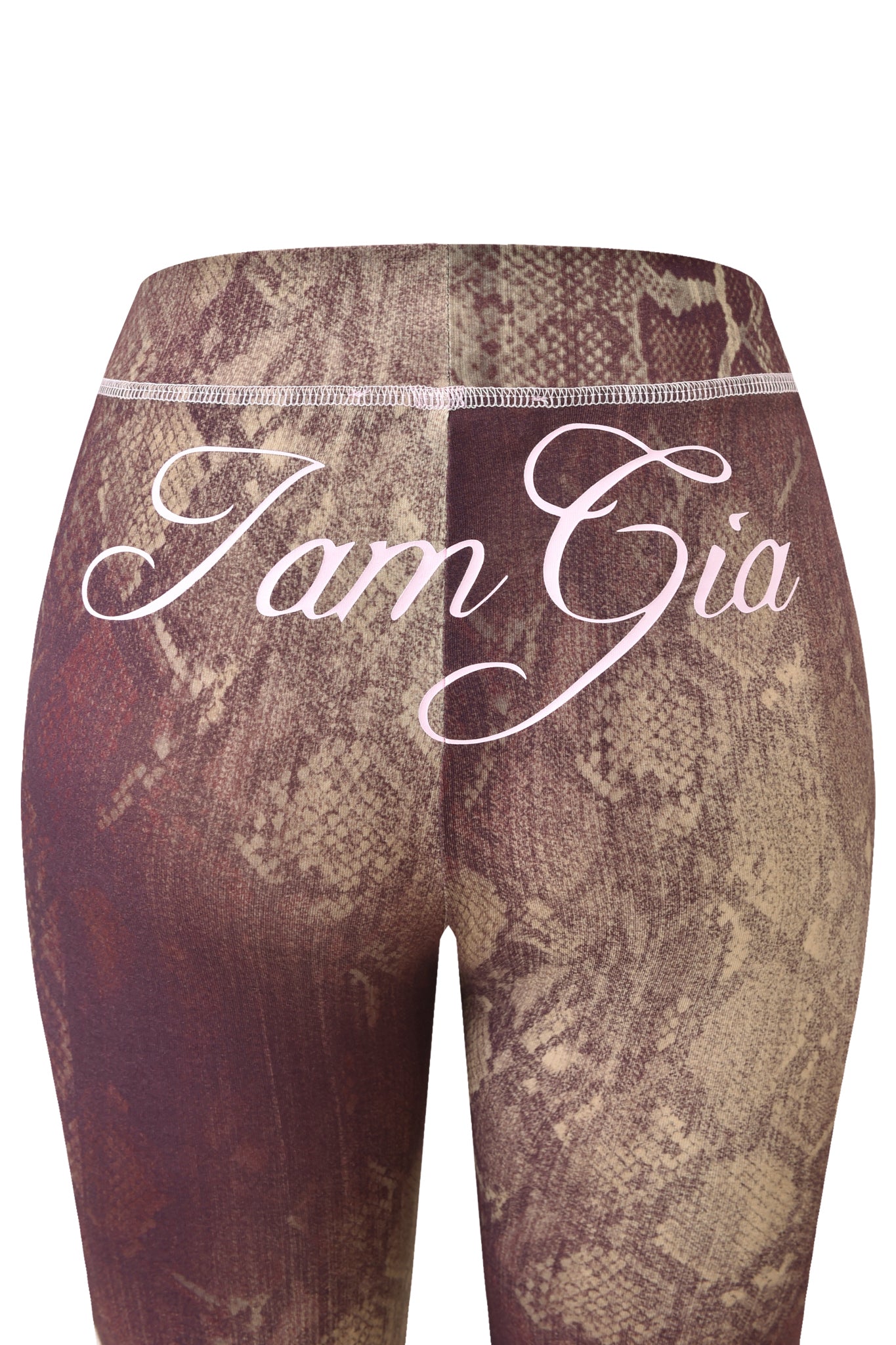Back view of the BLARE TRACKPANT - SNAKE by I.AM.GIA, featuring a brown snake print and bold white "I.AM.GIA" lettering across the waistband.