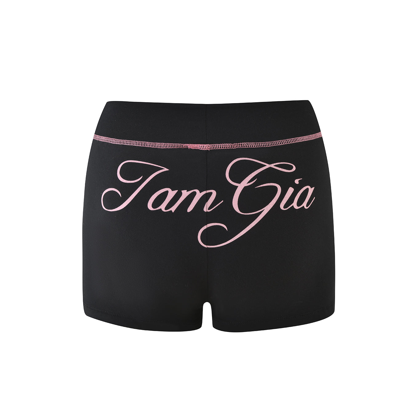 The BLARE SHORT - BLACK by I.AM.GIA features a bodycon fit, high waistband, black athletic style, and pink cursive "I am Gia" on the back. Made from bamboo for comfort and sustainability.