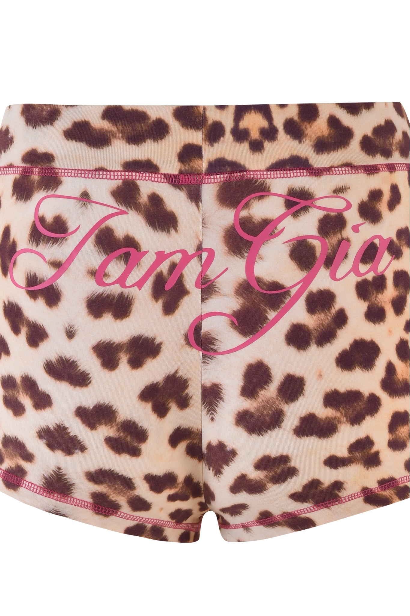 The BLARE SHORT - NEUTRAL : LEOPARD : WILD CARD from I.AM.GIA showcases a striking leopard print and prominently features the brand's logo in vivid pink cursive letters across the back.