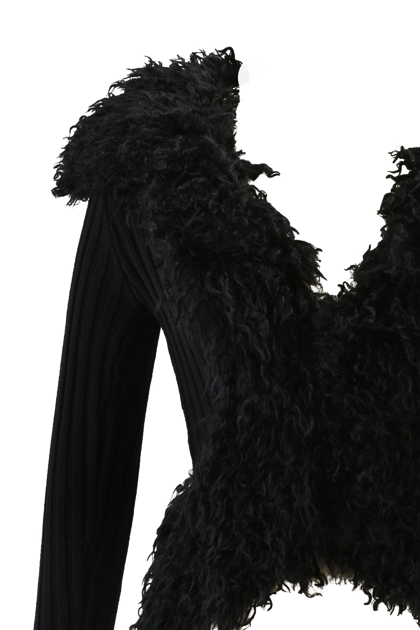 A close-up of I.AM.GIA's CRESSIDA JACKET in black—a ribbed knit, long-sleeve sweater with a shaggy faux fur front and an elevated wide, slightly asymmetrical neckline.