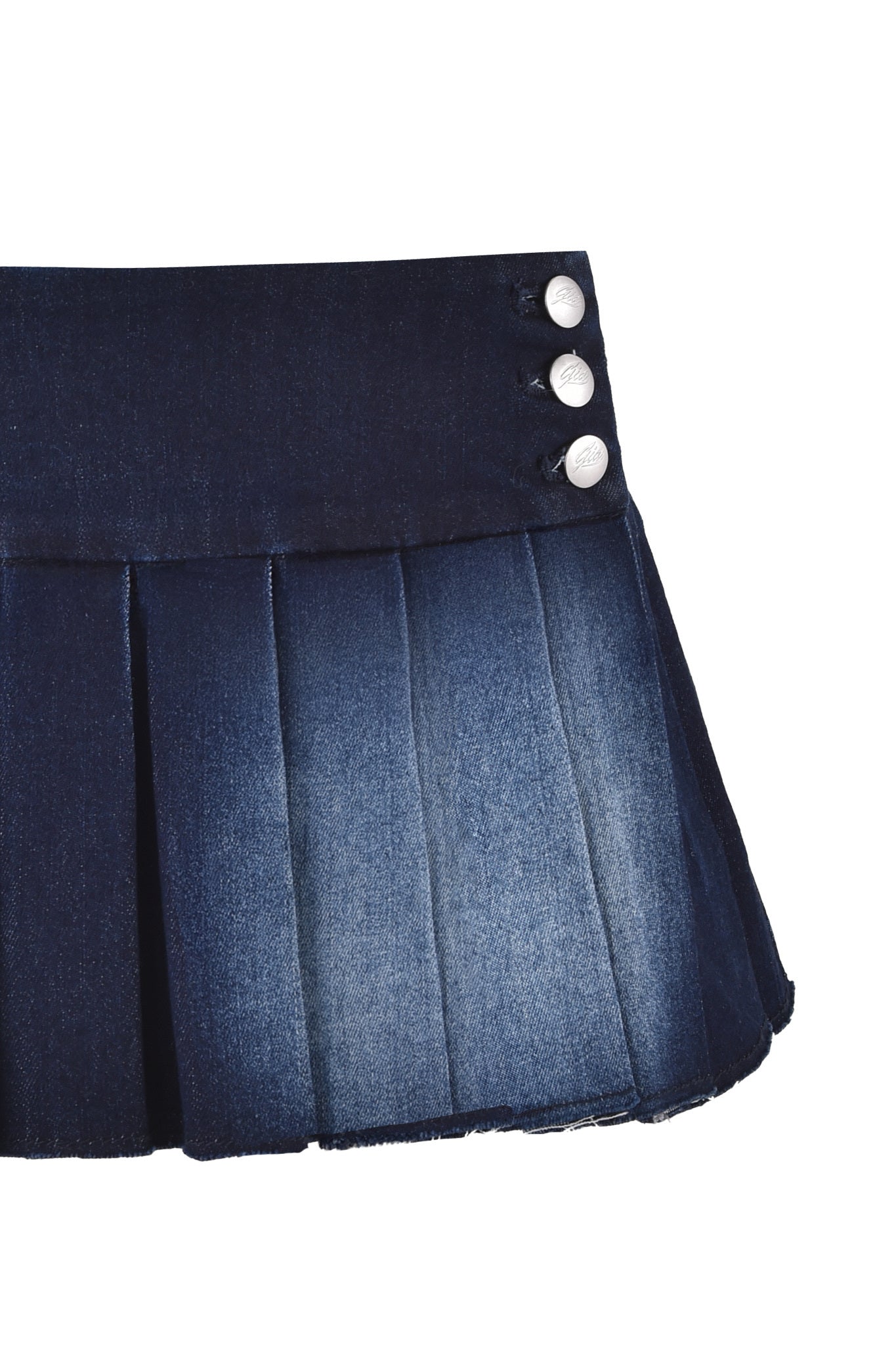 A close-up of the I.AM.GIA REMINI DENIM SKORT in dark denim blue, featuring micro-mini pleats and three silver buttons on its wide waistband.