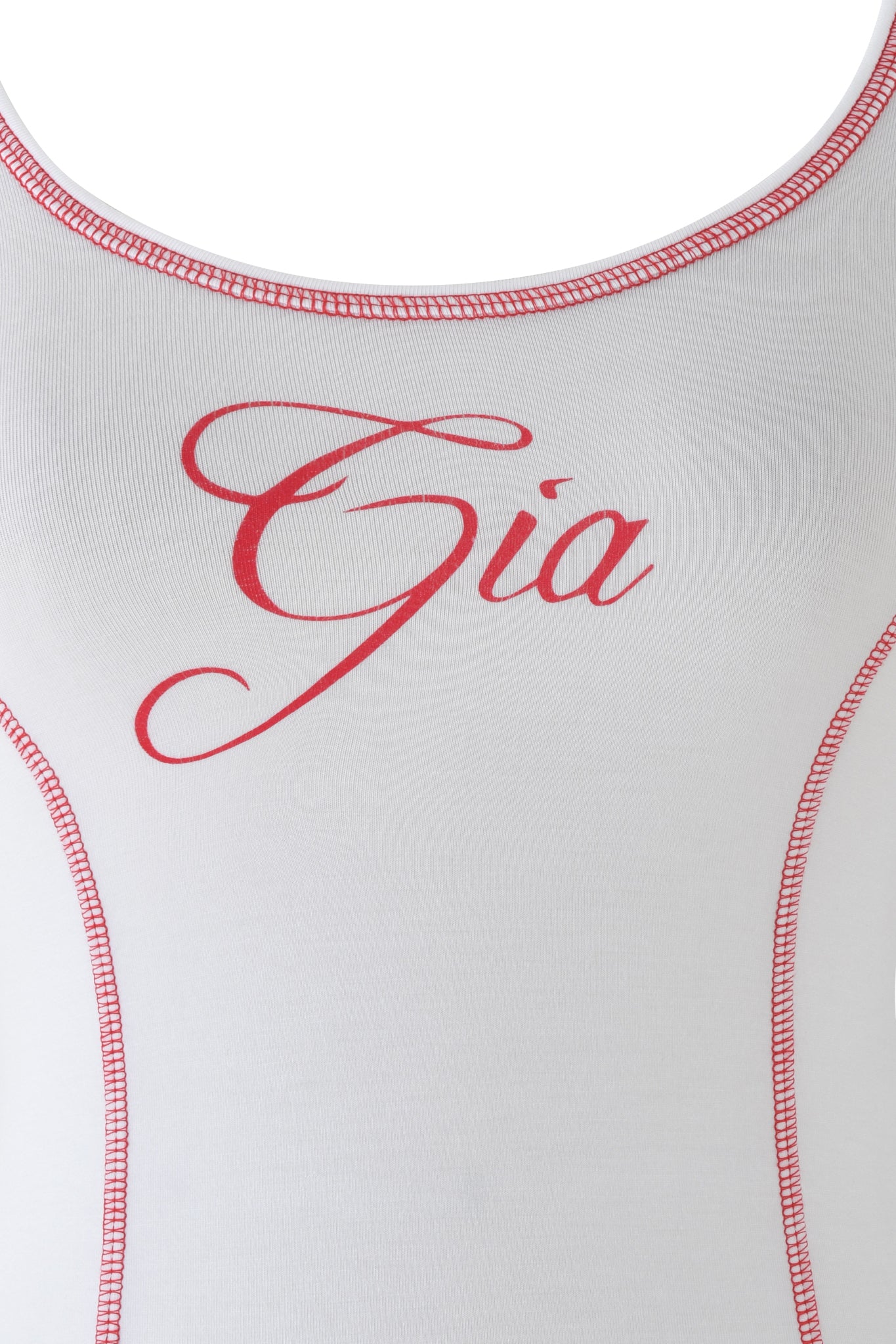 Close-up of the BLARE TANK - WHITE by I.AM.GIA, featuring red stitching and "Gia" in red cursive across the chest.