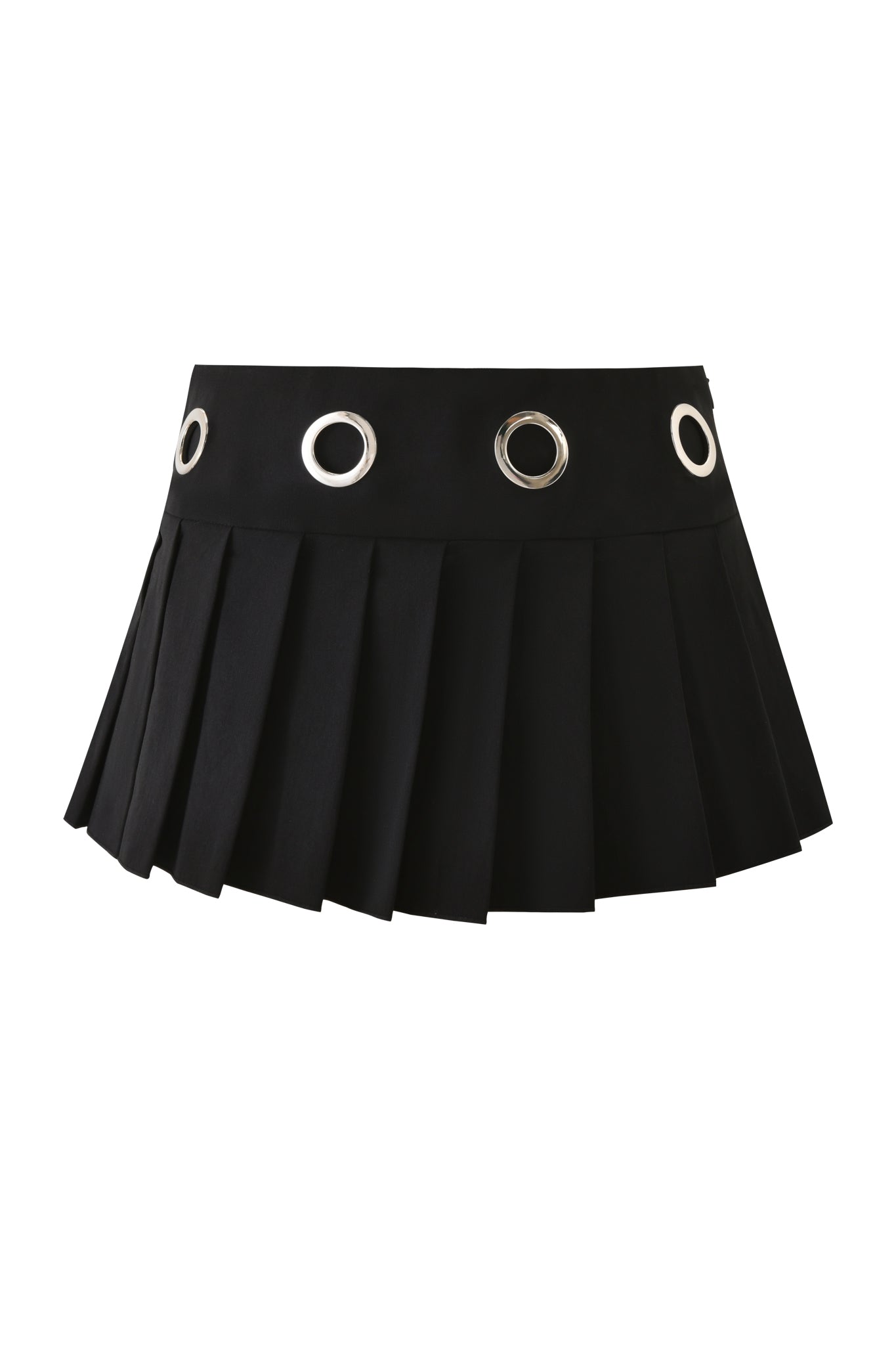 The JAYMES SKORT - BLACK by I.AM.GIA is a black pleated mini skort featuring a low-rise waist and large silver grommet details around the waistband, shown against a plain white background.