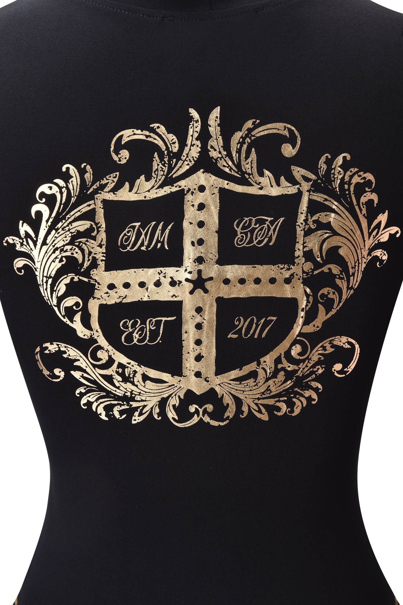 The BLARE FORM MULTI POCKET HOODIE in black and gold by I.AM.GIA features a gold ornate crest with a cross, leafy accents, and the inscriptions "IAM," "SN," and "EST 2017" on the back.