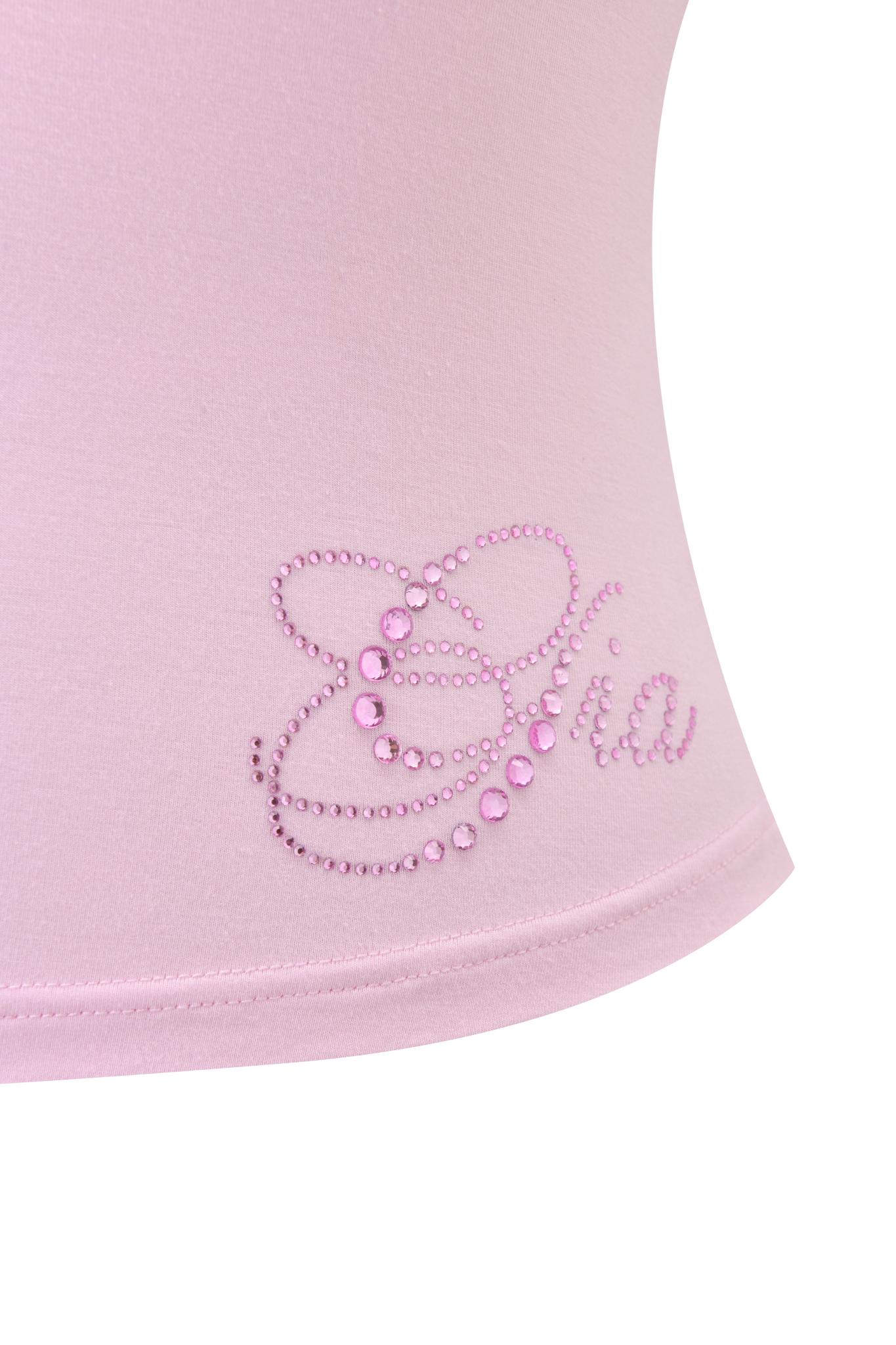 Close-up of the MELANIE CAMI - PINK by I.AM.GIA, light pink bamboo fabric with "Gia" in shiny pink rhinestones and a decorative swirl on the left side.