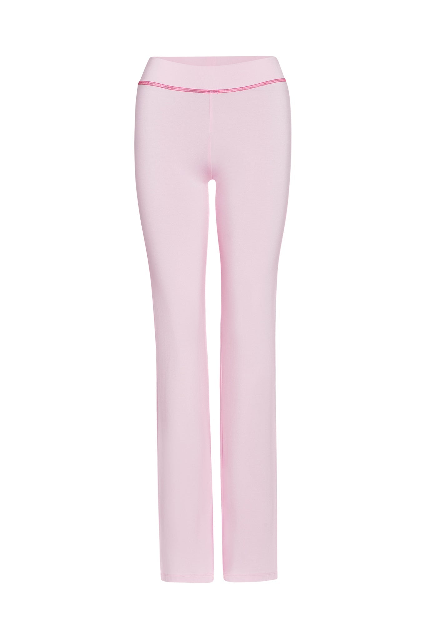 The BLARE TRACKPANT - PINK from I.AM.GIA is a pair of pastel pink, full-length leggings with a slim fit and an elastic waistband. These leggings feature a simple, sleek design and are made from soft, stretchy fabric.