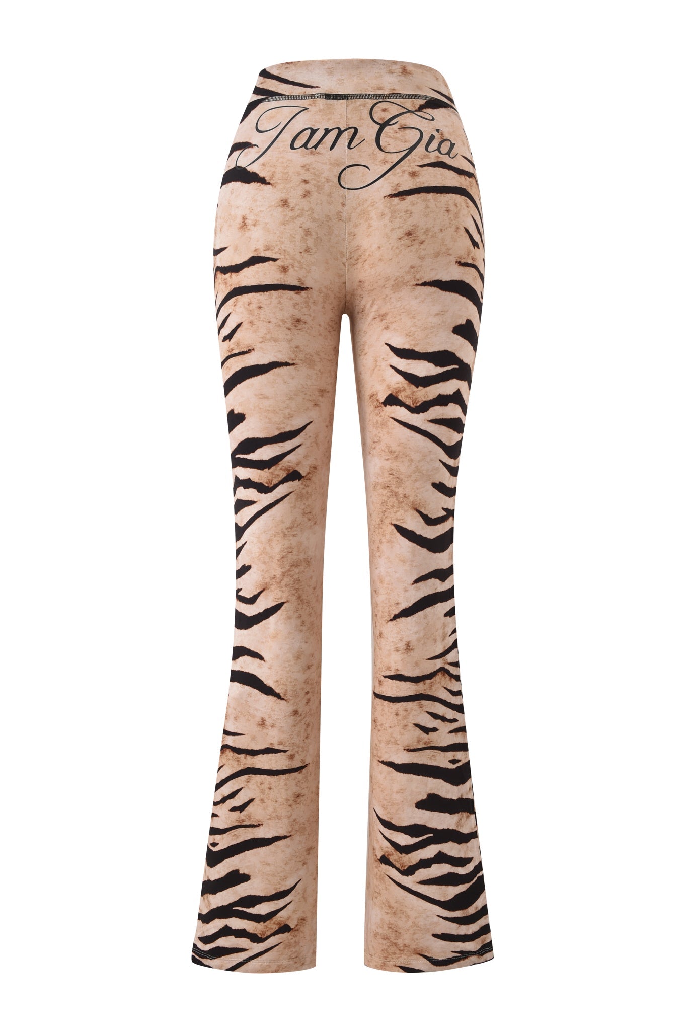 The BLARE TRACKPANT - WILD SIDE by I.AM.GIA features a high-waisted, flared fit with a beige and brown tiger stripe print, plus “I am Gia” in black cursive on the waistband.