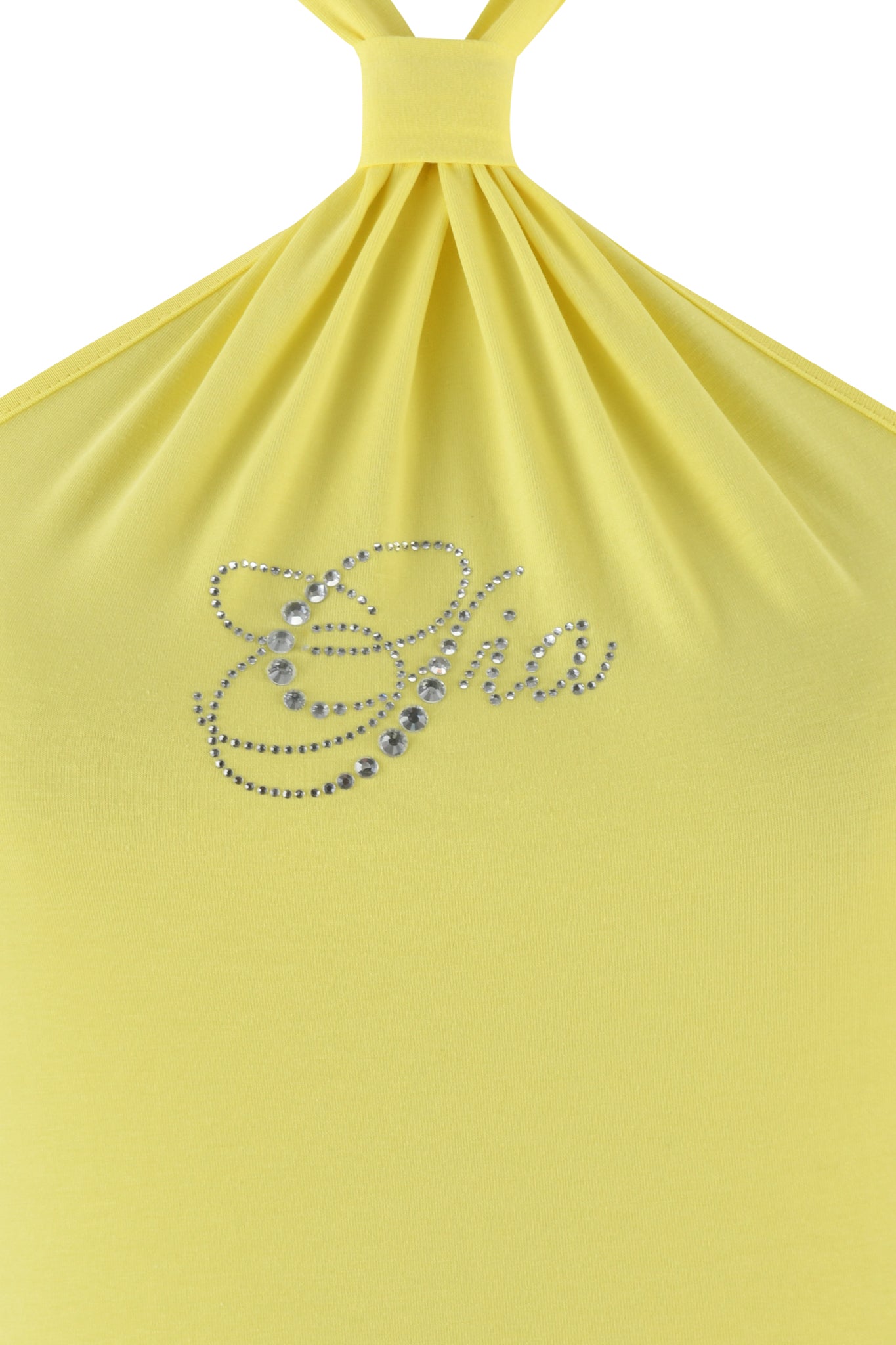 The ROWAN TOP - YELLOW by I.AM.GIA is a baby yellow halter top with a bodycon fit, crafted from bamboo fabric. Rhinestones elegantly spell "Cha" across the chest for a dazzling finish.