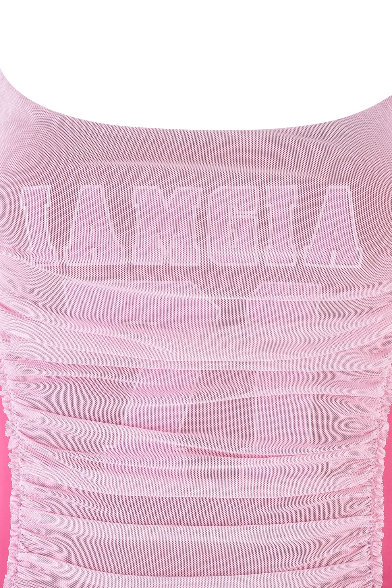 Close-up of a pink ruched SUKI TANK by I.AM.GIA, featuring a custom GIA print in bold. The sheer, textured fabric has horizontal gathers and a bodycon fit, ideal for highlighting the slinky style.