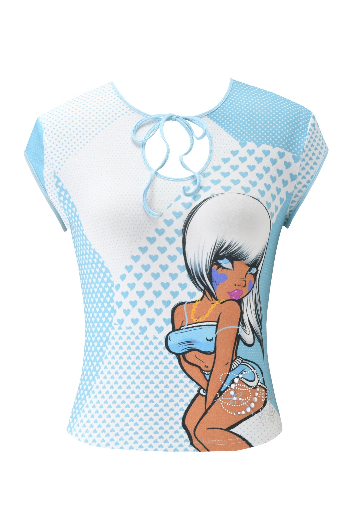 The FAFI TOP - BLUE by I.AM.GIA is a light blue crop top with cap sleeves, a tie-front neckline, and a cartoon woman with long white hair, purple eyeshadow, and a blue outfit on a heart-patterned background.