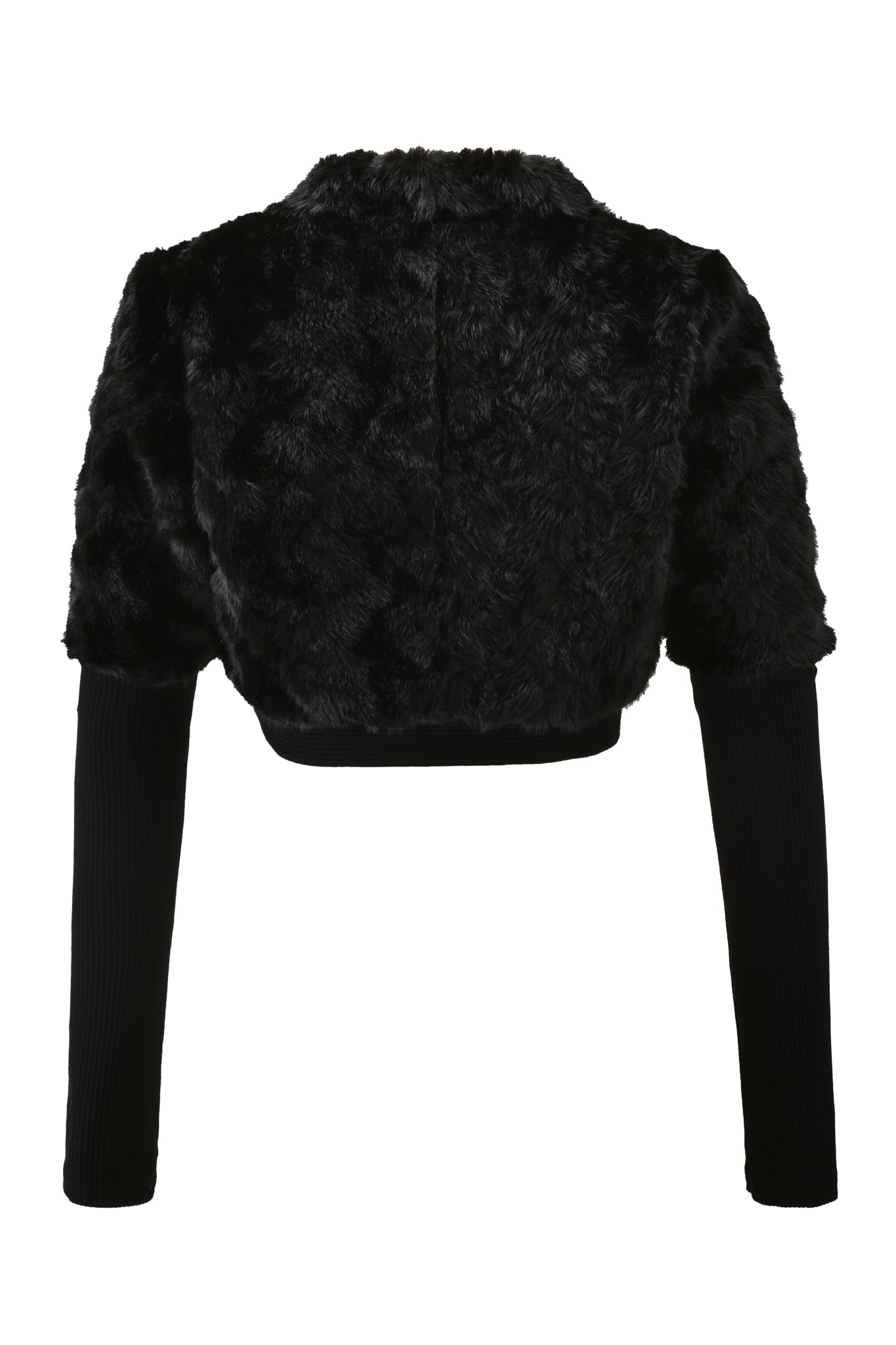The RUBY BOLERO - BLACK by I.AM.GIA features a cropped faux fur jacket with short sleeves layered over long, fitted rib knit sleeves, shown against a white background.