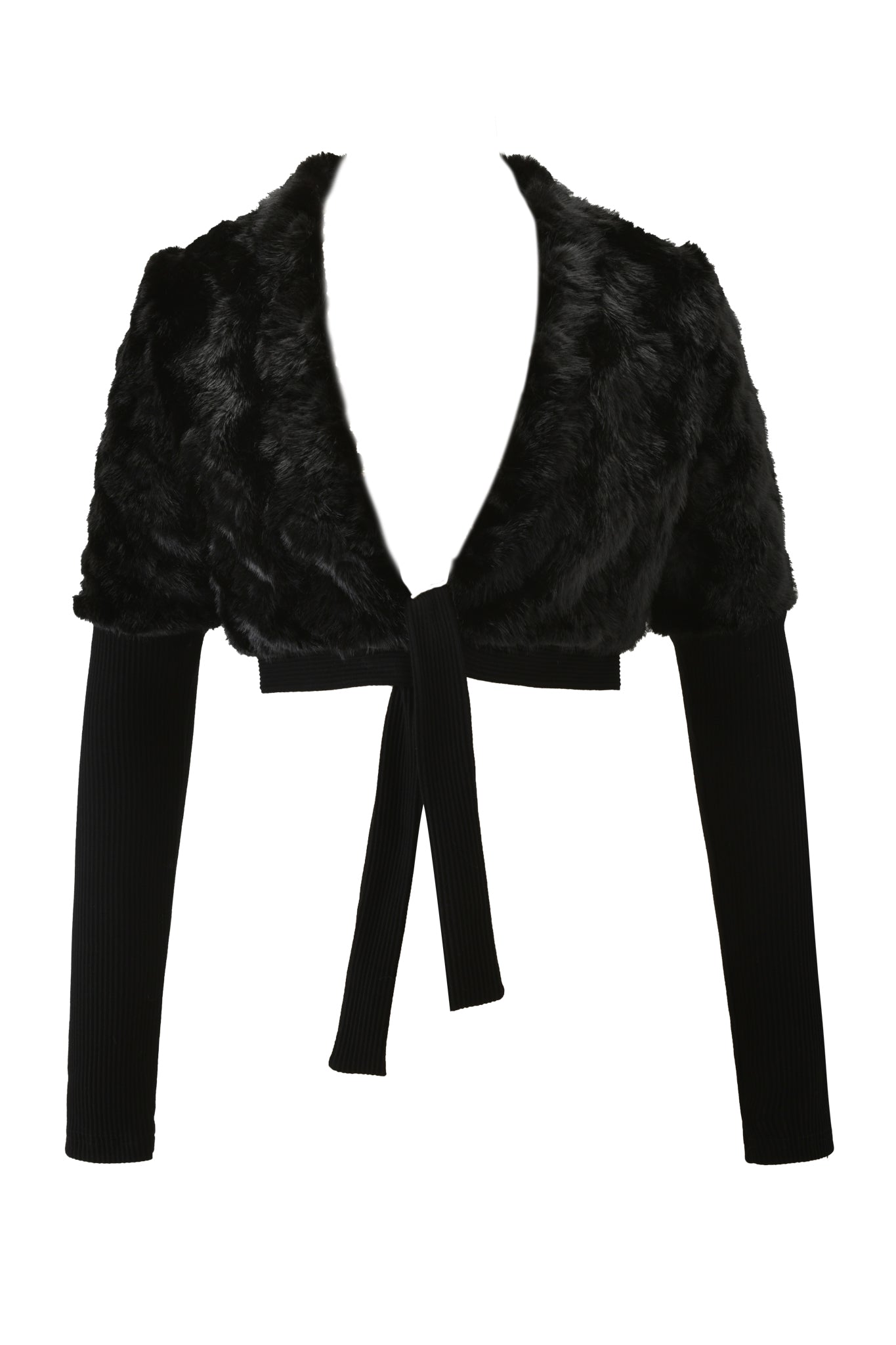 The RUBY BOLERO - BLACK by I.AM.GIA is a chic black cropped faux fur jacket with rib knit sleeves and a front tie closure, shown on a white background.
