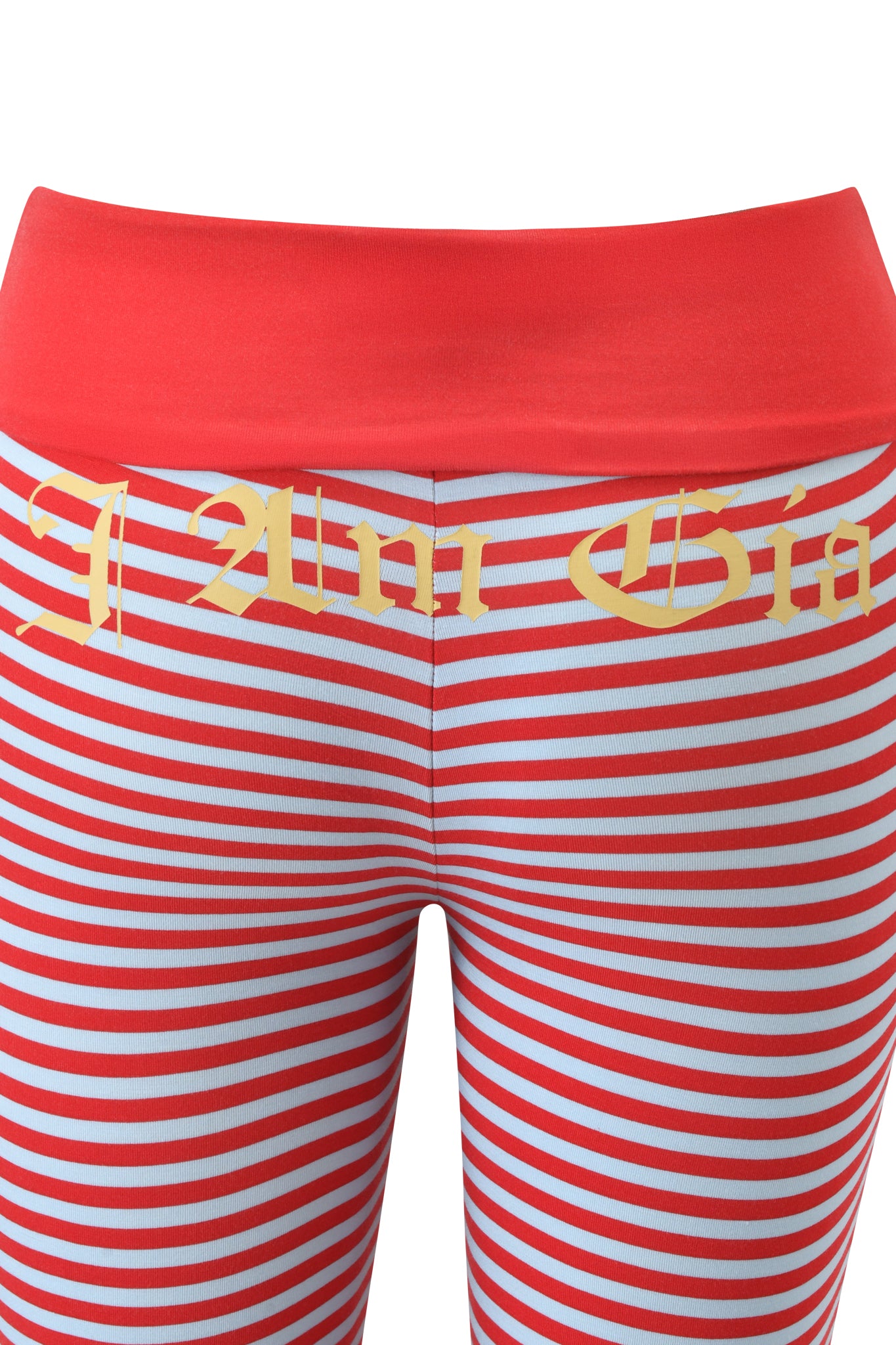 The BLARE FOLDOVER TRACKPANT by I.AM.GIA features red and blue stripes, a wide red waistband, and yellow Old English-style "I Am Gia" text on the front, all crafted from buttery-soft viscose for signature comfort.