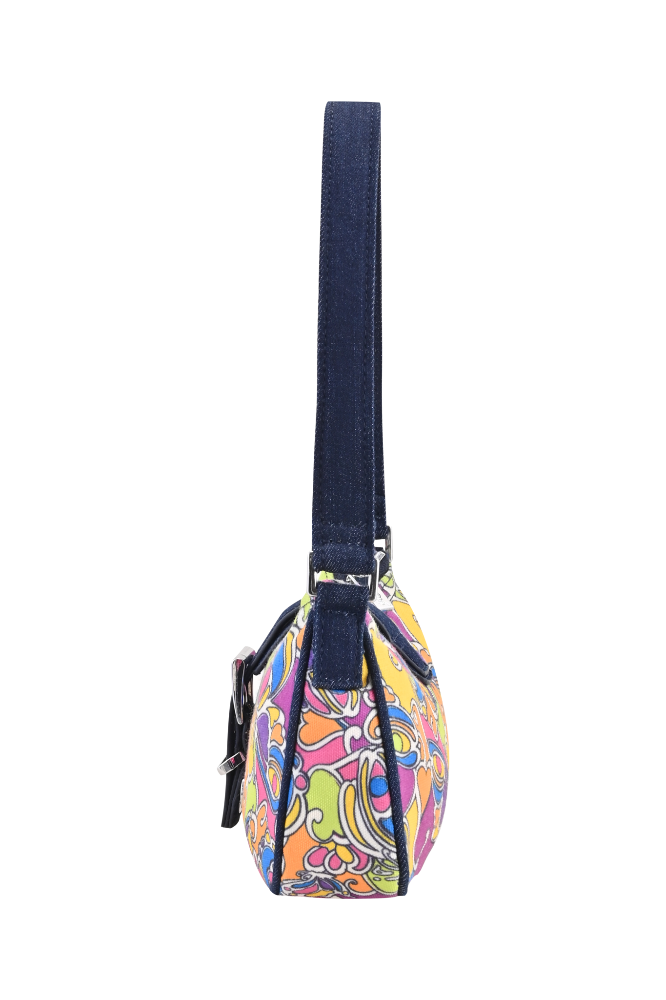 Side view of the I.AM.GIA LILLIA BAG - TROPICAL BUTTERFLY BLOOM, a small round handbag featuring a dark blue strap and a vivid swirl pattern in yellow, pink, orange, and green. The bag is upright against a neutral background.