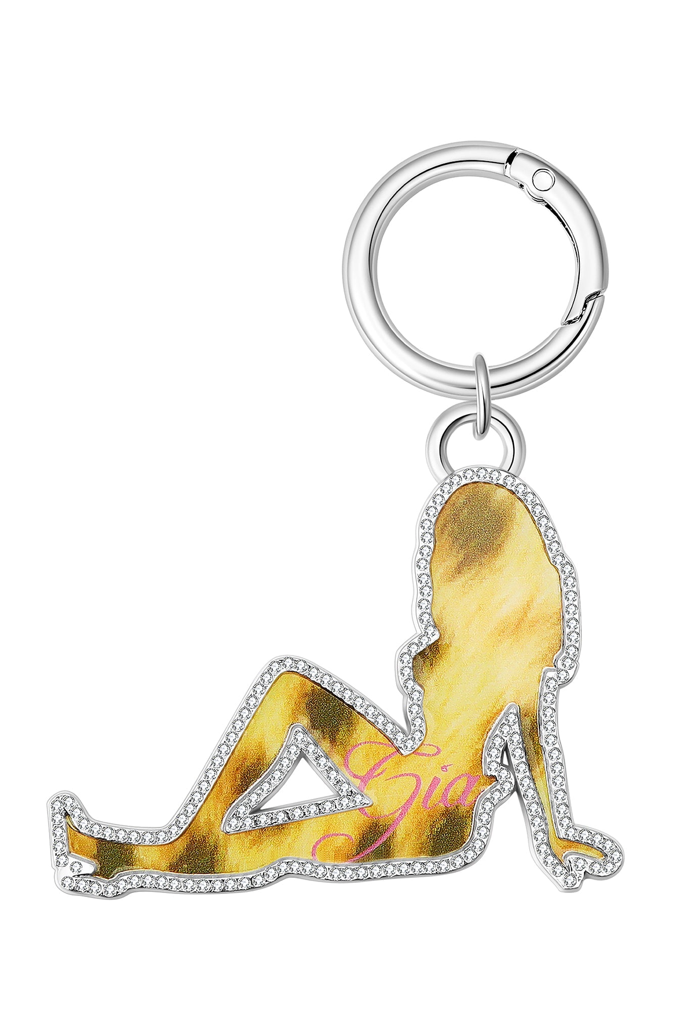 The I.AM.GIA X VON DUTCH GIRL KEYCHAIN features a pink leopard-print silhouette of a reclining woman with rhinestone accents, attached to a silver keyring.