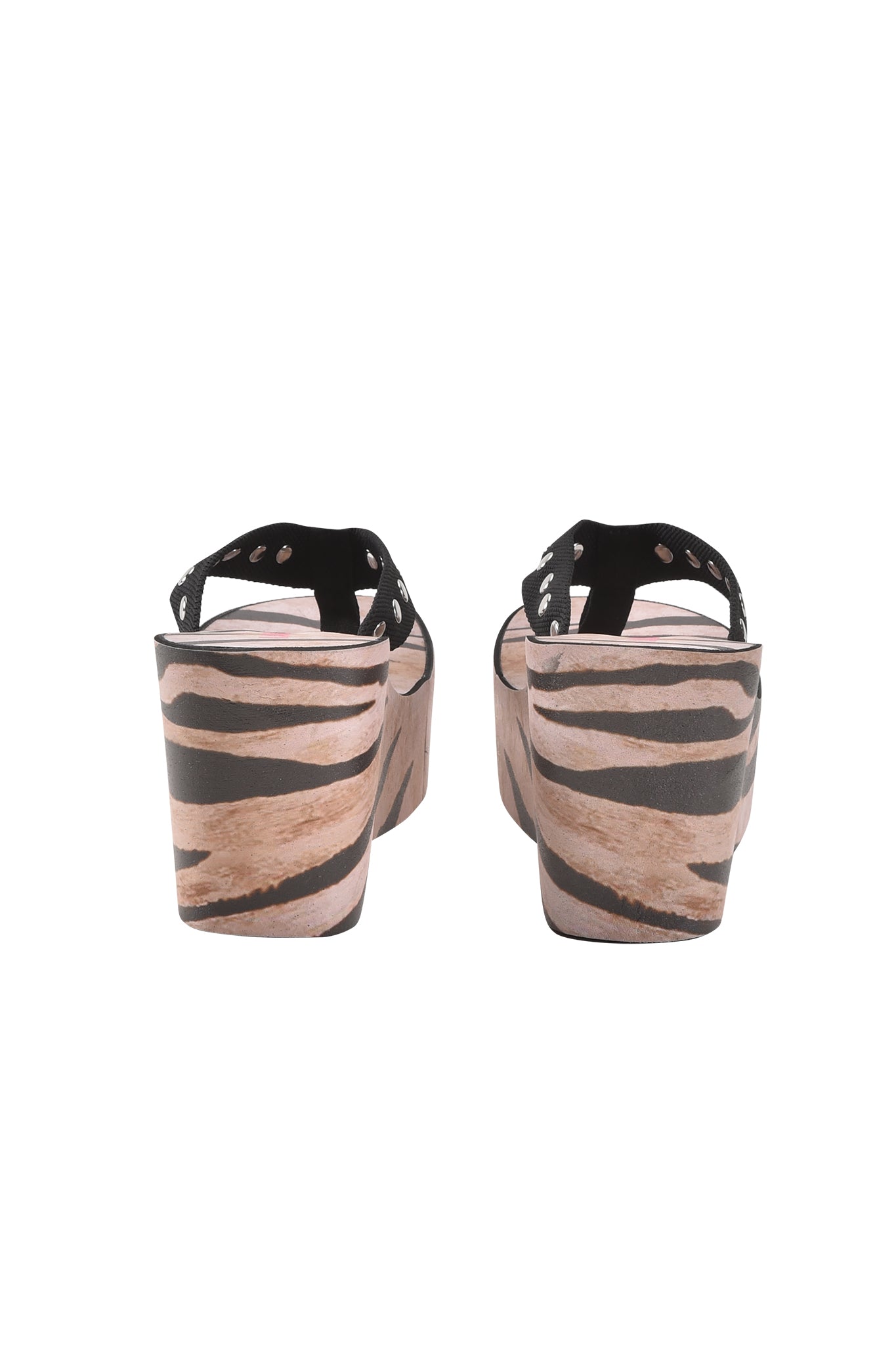 Back view of the I.AM.GIA SHELBY STUDDED FLIP FLOP 2.0 - WILD SIDE, a platform wedge sandal with animal print heels and black straps featuring silver studs, shown against a white background.