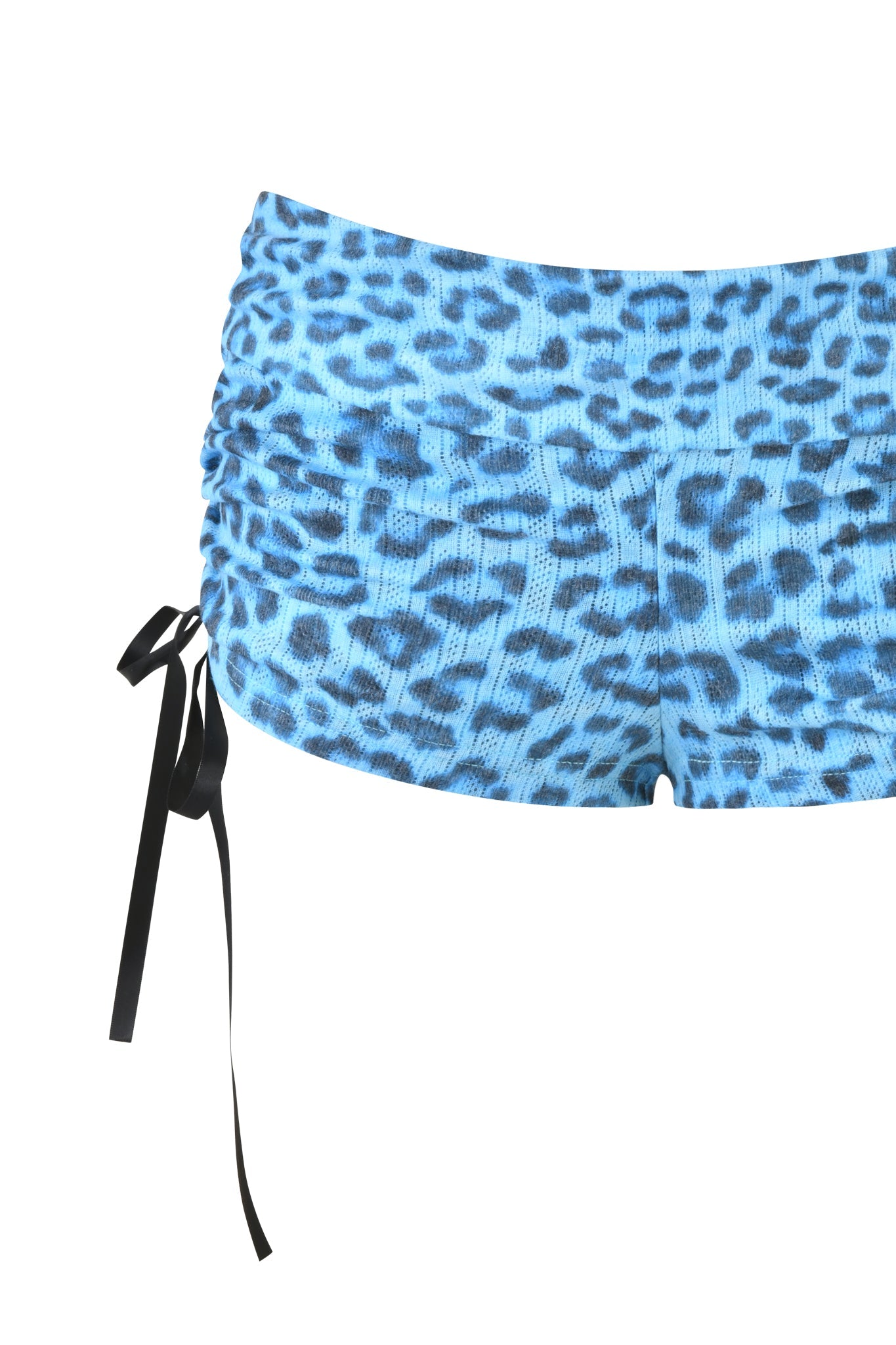 The I.AM.GIA MIA SHORT in teal leopard features a low-rise fit, side ruching, and a black ribbon tie, shown against a white background.
