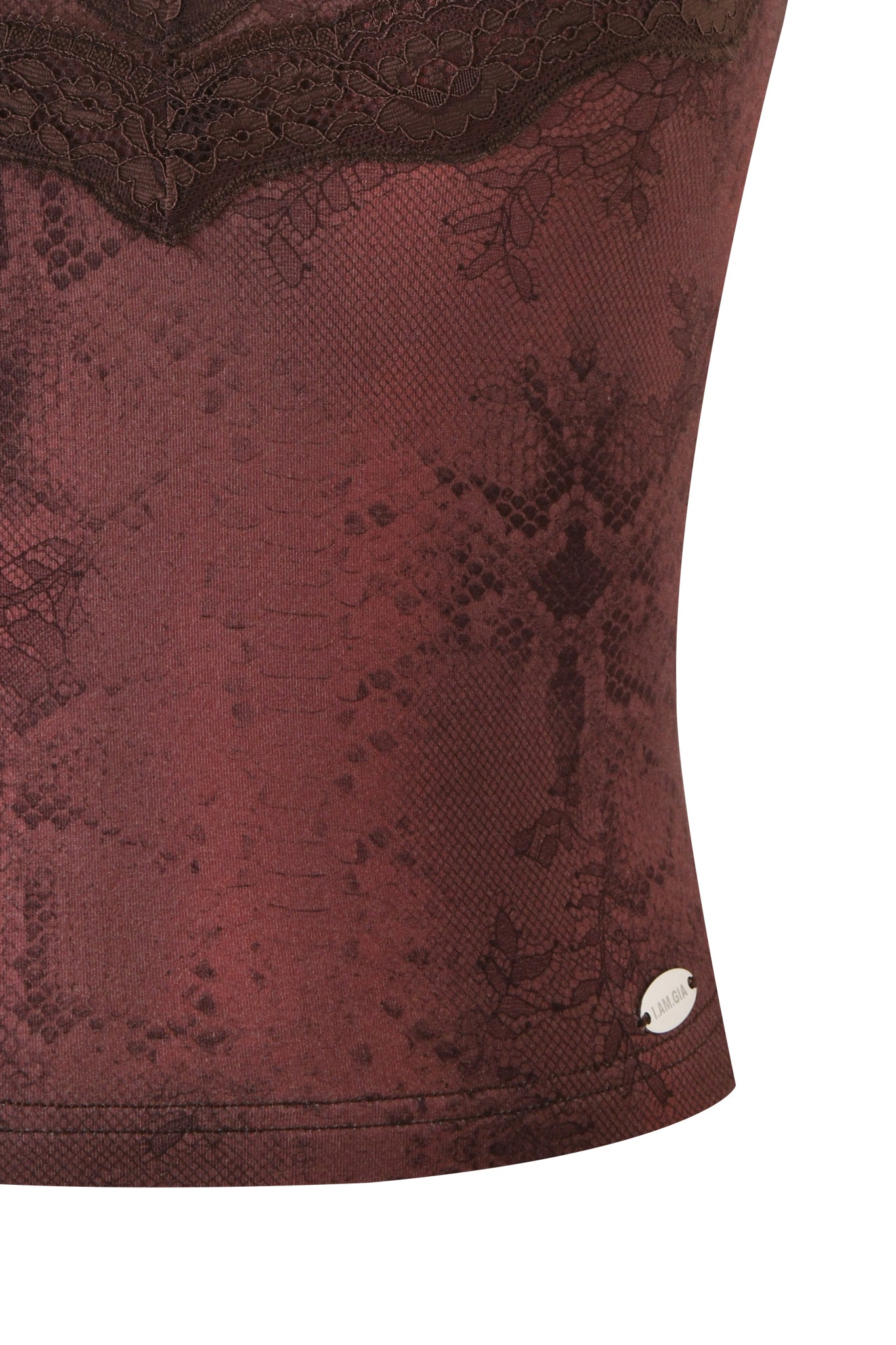 Close-up of the BEAU TOP - BROWN by I.AM.GIA, featuring maroon lace-patterned fabric with a floral design, scalloped trim at the top, and a small metallic tag near the hem.